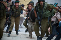Daniella Kertesz as Segen and Brad Pitt as Gerry Lane in "World War Z."