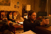 Mireille Enos as Karin Lane, Sterling Jerins as Constance Lane, Abigail Hargrove as Rachel Lane and Brad Pitt as Gerry Lane in "World War Z."