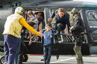 Sterling Jerins as Constance Lane, Mireille Enos as Karin Lane, Fabrizio Zacharee Guido as Tomas, and Brad Pitt as Gerry Lane in "World War Z."