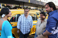Sonakshi Sinha, producer Rahul Mittra, director Tigmanshu Dhulia and Saif Ali Khan on the set of "Bullett Raja."