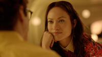 Joaquin Phoenix as Theodore and Olivia Wilde as Blind Date in "Her."