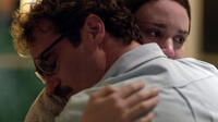 Joaquin Phoenix as Theodore and Rooney Mara as Catherine in "Her."