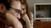 Joaquin Phoenix as Theodore and Rooney Mara as Catherine in "Her."