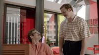 Joaquin Phoenix as Theodore and Chris Pratt as Paul in "Her."