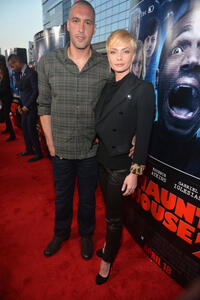 Hamzi Hijazi and Jaime Pressly at the California premiere of "A Haunted House 2."