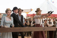 Charlize Theron and Amanda Seyfried in "A Million Ways to Die in the West."