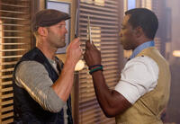 Jason Statham as Lee Christmas and Wesley Snipes as Doc in "The Expendables 3."