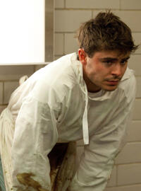 Zac Efron as Dr. Jim Carrico in "Parkland."