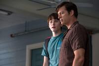 Nathan Gamble as Sawyer Nelson and Harry Connick Jr. as Dr. Clay Haskett in "Dolphin Tale 2."