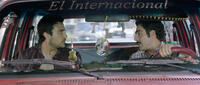 Jaime Camil as Alejandro and Omar Chaparro as Canicas in "Pulling Strings."
