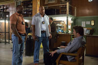 Lucky Johnson as Johnson, Dwayne Johnson as James Ransome and Liam Hemsworth as Chris Potamitis in "Empire State."