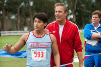 Carlos Pratts as Thomas Valles and Kevin Costner as coach Jim White in "McFarland, USA."