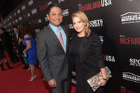 Omar Leyva and guest at the California premiere of "McFarland, USA."