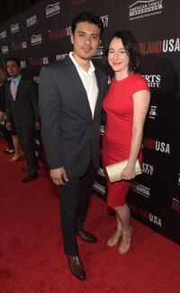Rigo Sanchez and guest at the California premiere of "McFarland, USA."