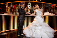 Stanley Tucci as Caesar Flickerman and Jennifer Lawrence as Katniss Everdeen in "The Hunger Games: Catching Fire."
