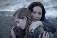 Jennifer Lawrence as Katniss Everdeen and Willow Shields as Primrose Everdeen in "The Hunger Games: Catching Fire."