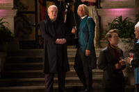 Philip Seymour Hoffman as Plutarch Heavensbee and Woody Harrelson as Haymitch Abernathy in "The Hunger Games: Catching Fire."