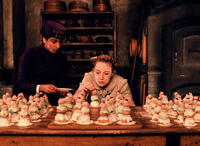 Tony Revolori as Zero Moustafa and Saoirse Ronan as Agatha in "The Grand Budapest Hotel."