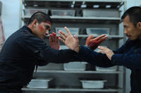 Iko Uwais as Rama and Cecep Arif Rahman as The Assassin in "The Raid 2."