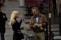 Amber Heard and Kevin Costner in "3 Days to Kill."