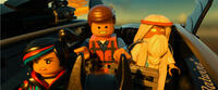 Wyldstyle voiced by Elizabeth Banks, Emmet voiced by Chris Pratt and Vitruvius voiced by Morgan Freeman in "The LEGO Movie."