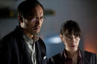 Ken Watanabe as Dr. Ishiro Serizawa and Sally Hawkins as Dr. Vivienne Graham in "Godzilla."