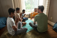Suraj Sharma as Rinku, Madhur Mittal as Dinesh, Pitobash as Amit and Jon Hamm as JB Bernstein in "Million Dollar Arm."