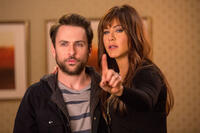 Charlie Day as Dale Arbus and Jennifer Aniston as Dr. Julia Harris in "Horrible Bosses 2."