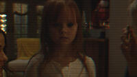 Ivy George as Leila in "Paranormal Activity: The Ghost Dimension."