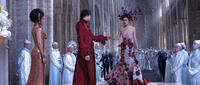 Gugu Mbatha-Raw as Famulus, Douglas Booth as Titus Abrasax and Mila Kunis as Jupiter Jones in "Jupiter Ascending."
