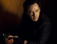 John Cusack as Jack in "The Bag Man."
