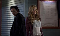 John Cusack as Jack and Rebecca DaCosta as Rivka in "The Bag Man."