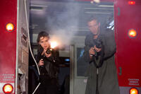 Emilia Clarke as Sarah Connor and Jai Courtney as Kyle Reese in "Terminator: Genisys."