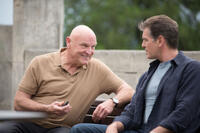 Bill Smitrovich and Pierce Brosnan in "The November Man."