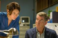 Olga Kurylenko as Alice Fournier and Pierce Brosnan as Peter Devereaux in "The November Man."