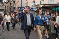 Pierce Brosnan as Peter Devereaux and Olga Kurylenko as Alice Fournier in "The November Man."