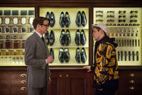 Colin Firth as Harry Hart and Taron Egerton as Eggsy in "Kingsman: The Secret Service."