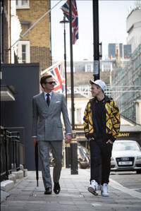 Colin Firth as Harry Hart and Taron Egerton as Eggsy in "Kingsman: The Secret Service."