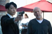 Rain as Mark and Bruce Willis as Omar in "The Prince."