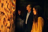 William Fichtner as Eric Sacks and Megan Fox as April O'Neil in "Teenage Mutant Ninja Turtles."
