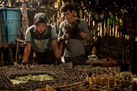 Ki Hong Lee as Minho and Dylan O'Brien as Thomas in "The Maze Runner."
