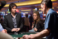 Mark Wahlberg as Jim Bennett and Brie Larson as Amy Phillips in "The Gambler."
