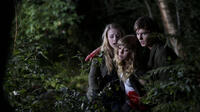 (L-R) Emily Tennant as Brit, Britt Irvin as Emma and Tyler Johnston as Kris in the horror film “FEED THE GODS” an XLrator Media release.  