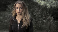 Emily Tennant as Brit in the horror film “FEED THE GODS” an XLrator Media release. 