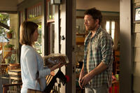 Jennifer Aniston as Claire and Sam Worthington as Roy in "Cake."