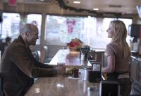 Jason Statham as Nick Wild and Anne Heche as Roxy in "Wild Card."
