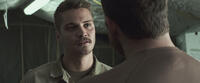 Luke Grimes as Marc Lee and Bradley Cooper as Chris Kyle in "American Sniper."
