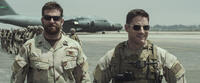 Bradley Cooper as Chris Kyle and Sam Jaeger as Navy Seal Lt. Martin in "American Sniper."