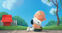 Snoopy voiced by Bill Melendez and Charlie Brown voiced by Noah Schnapp in "The Peanuts Movie."