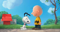 Snoopy voiced by Bill Melendez and Charlie Brown voiced by Noah Schnapp in "The Peanuts Movie."